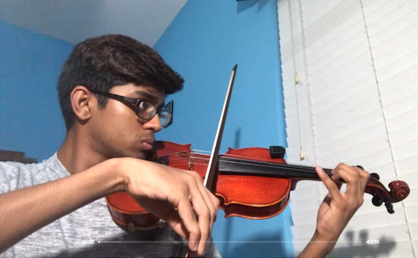 Mahit plays the violin.